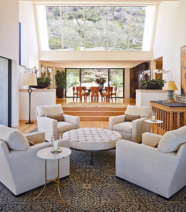 Condo design: living room with leopard sofa and bright patterns