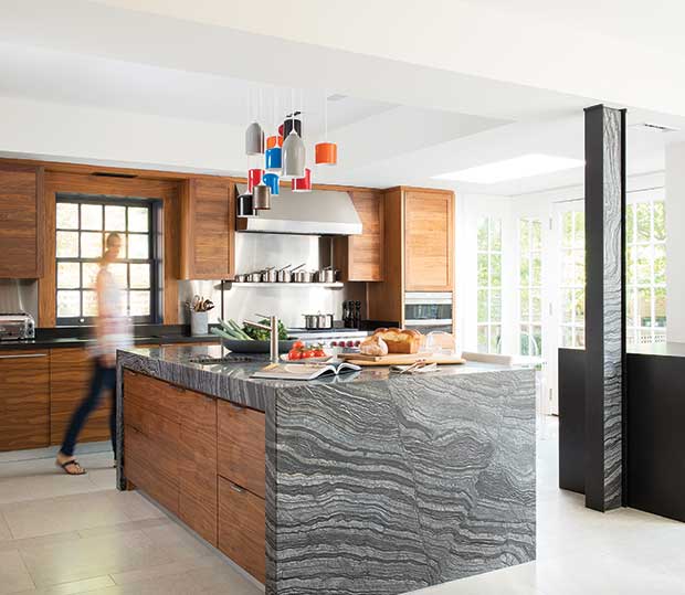 Warm wood kitchen with Silver Wave marble island