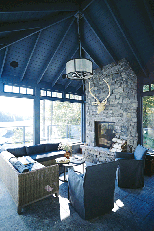 Indoor patio with blue statement ceiling. Statement ceilings