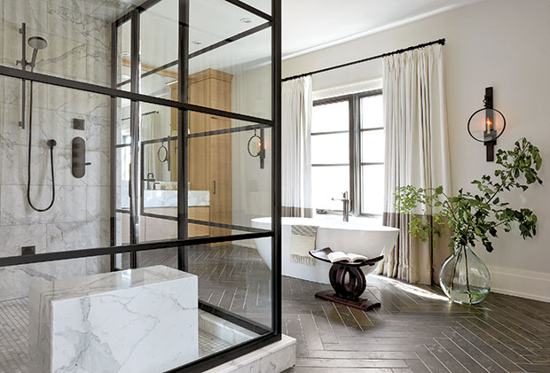 Nam Dang-Mitchell's design of a principal bathroom with drapes that highlight the tub.