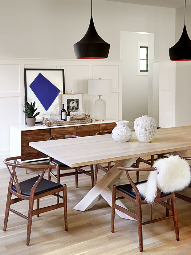 Nam Dang-Mitchell's design of a dining room with Scandinavian-inspired pieces and bold graphic accessories.
