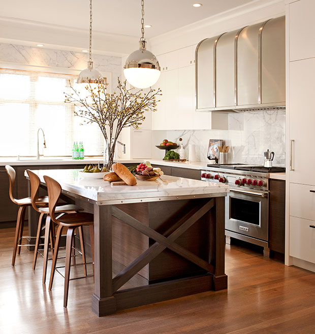 Nam Dang-Mitchell's design in a kitchen with dark wood features and industrial accents.