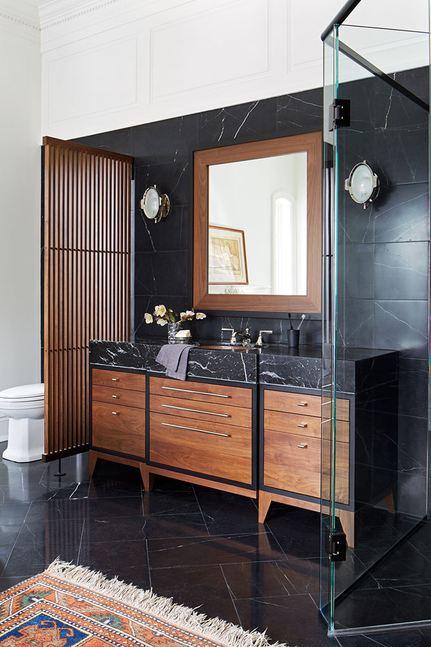 A natural wood cabinet in the bathroom