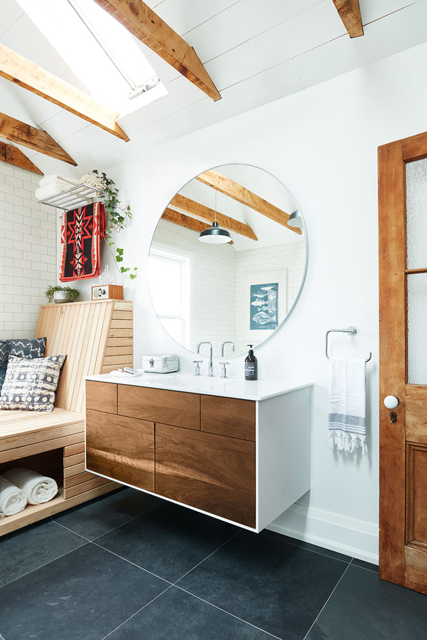 A natural wood cabinet in the bathroom