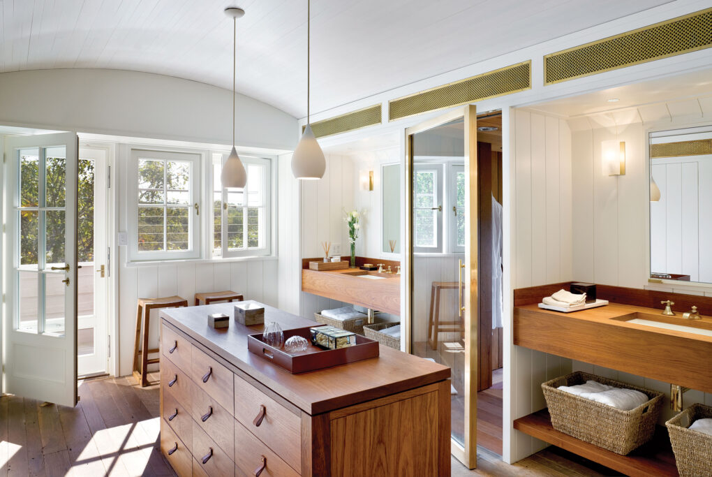 A natural wood cabinet in the bathroom