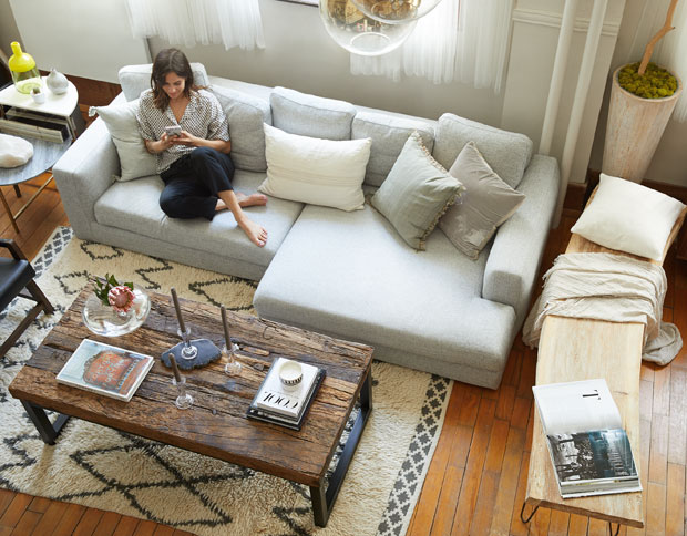 Amelie Simard lounging in her Montreal loft living room