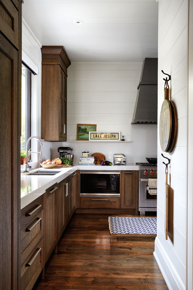 A rustic cottage fall getaway with natural wood cabinets