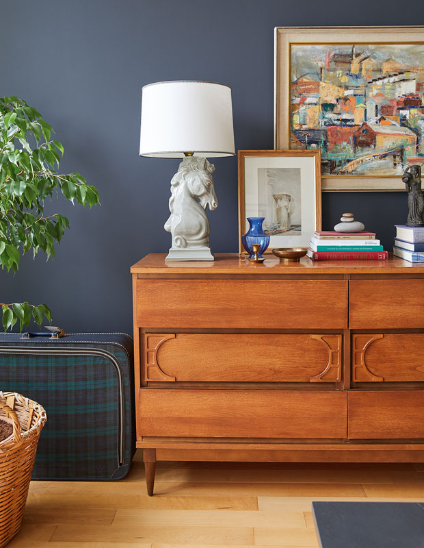Valérie Morisset's living room dresser with vintage accessories.