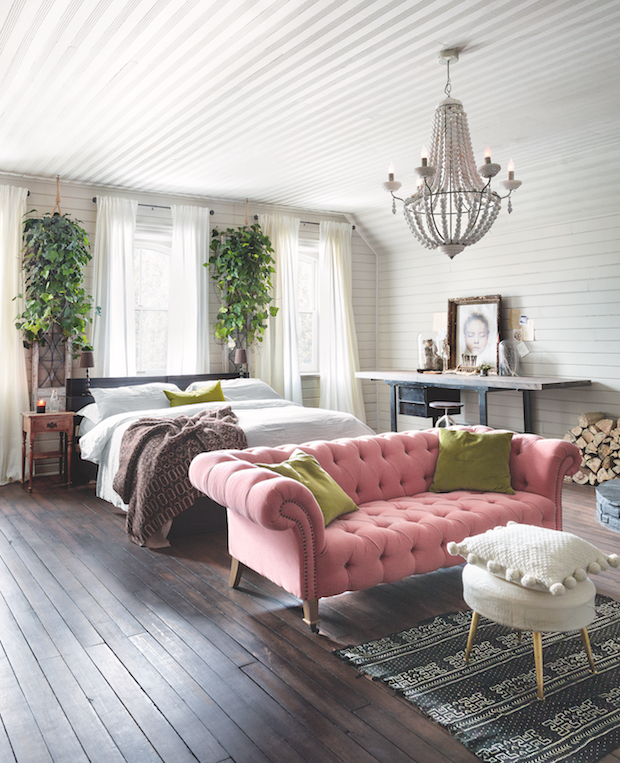 Luxurious bedroom with a pink sofa