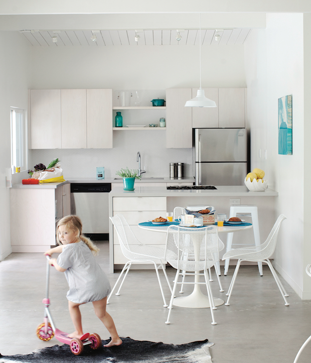 Sleek modern kitchen with cement floors