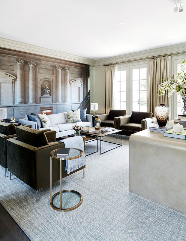 The living room of 2018 Princess Margaret Showhome with a mural of the Château de Versailles.