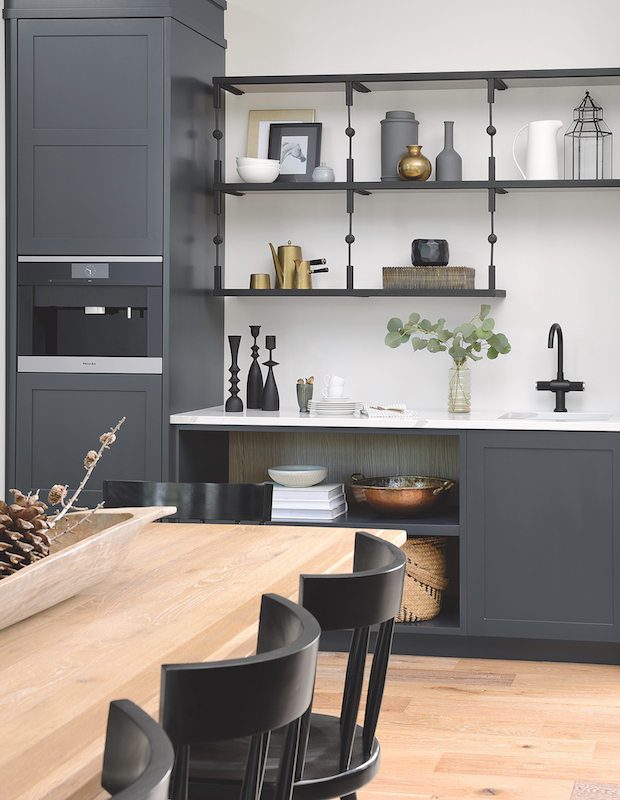 Charcoal grey cabinetry adds moodiness