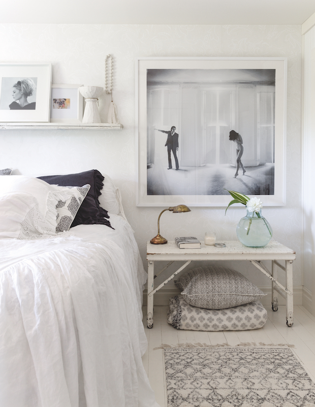 Minimalistic white bedroom with Scandinavian inspired design