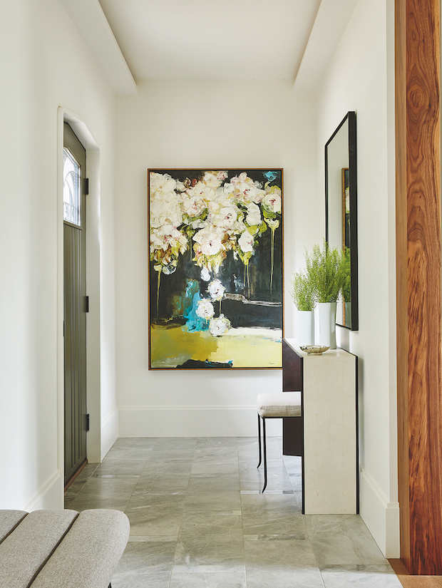 Art-focused entryway with clean walls and beautiful art
