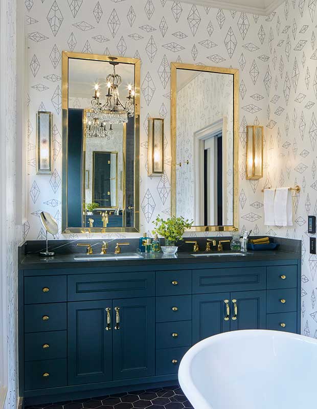 Second bathroom with a blue and gold palette