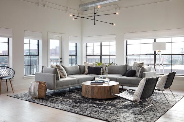 Sleek modern living area with wood coffee table