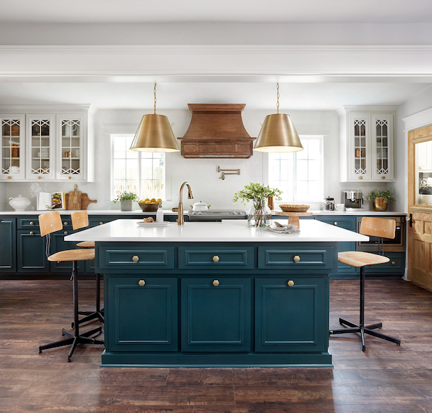 Contemporary kitchen with a teal island
