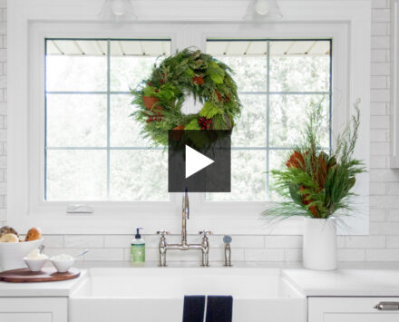 Winter-White holiday house with greenery