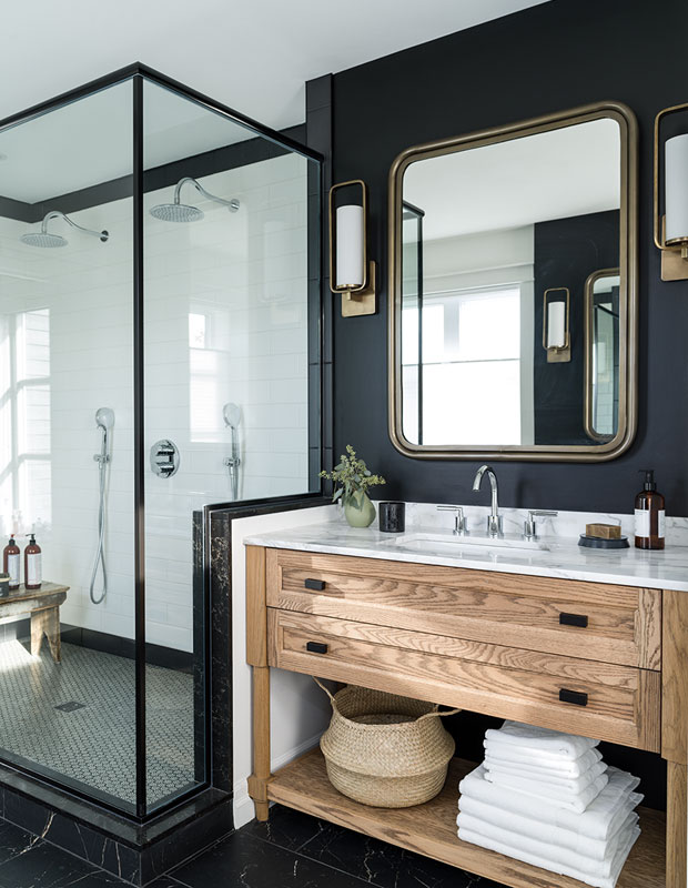 Top Pinterest Images of 2018 - a moody bathroom with black walls, piping and natural wood cabinets