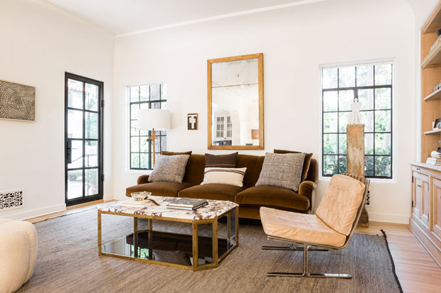 Nate Berkus and Jeremiah Brent living room with plush pillows and a neutral palette