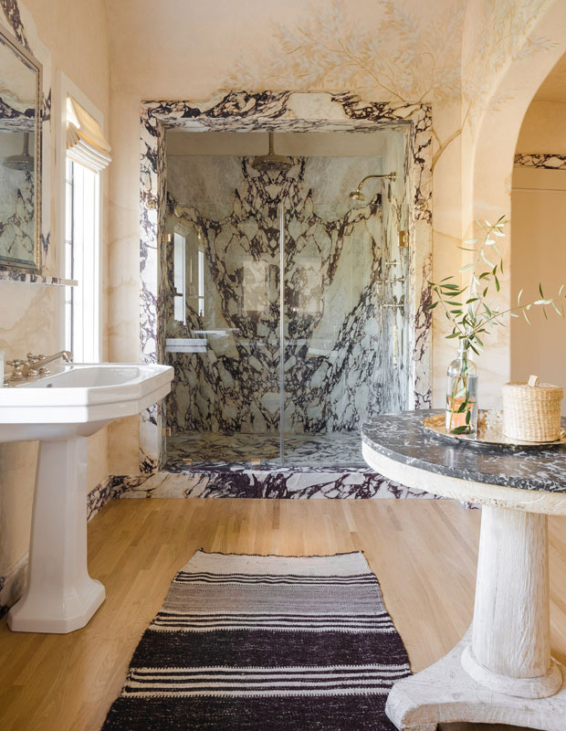 Nate Berkus and Jeremiah Brent principal bathroom with a statement marble shower