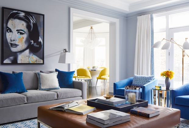 Anne Hepfer global family home family room with pops of blue and yellow and a Grace Kelly painting