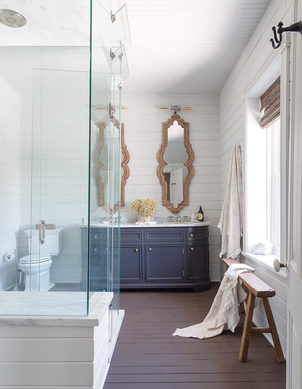 Designer Elle Patille bathroom with statement mirrors and glass shower