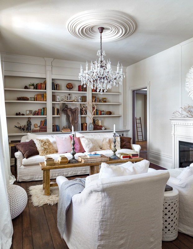 Designer Elle Patille living room with white linen sofas and colorful pillows