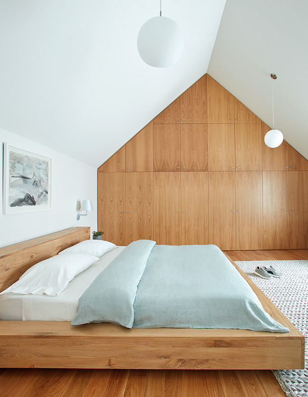 Minimalist spaces bedroom with hidden storage