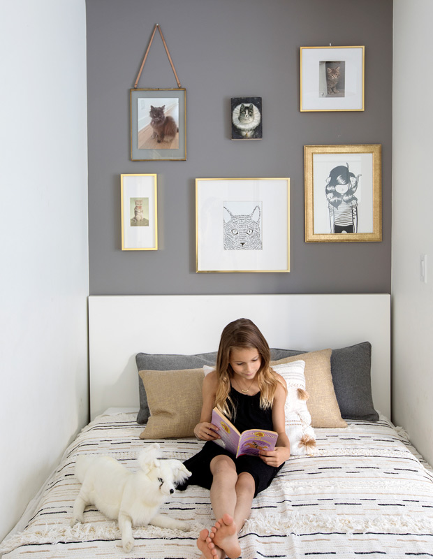 Organized family homes kids room with gallery wall