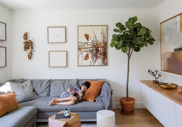 Organized family homes living room with a boho vibe