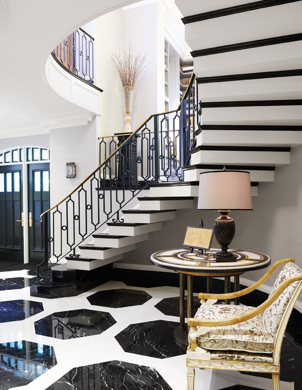 James Davie opulent townhouse front entrance with high-gloss floors and winding staircase