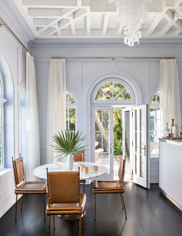 A lilac colored dining area in a Palm Beach home