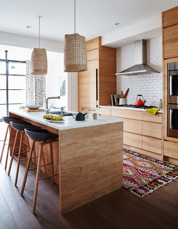 Ali Yaphe family home kitchen with natural wood cabinetry and island