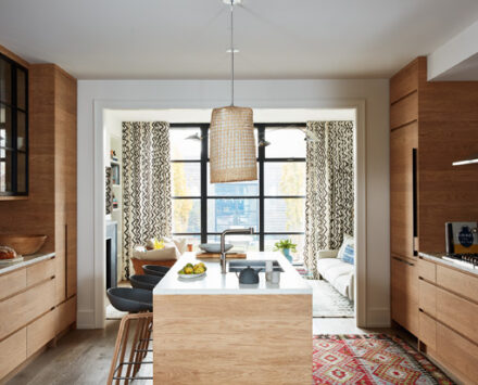 Ali Yaphe family home kitchen with natural wood cabinetry and island