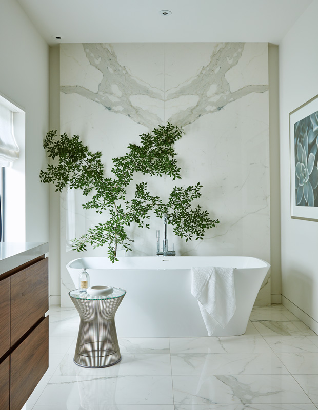 Beautiful bathrooms with a graphic marble wall