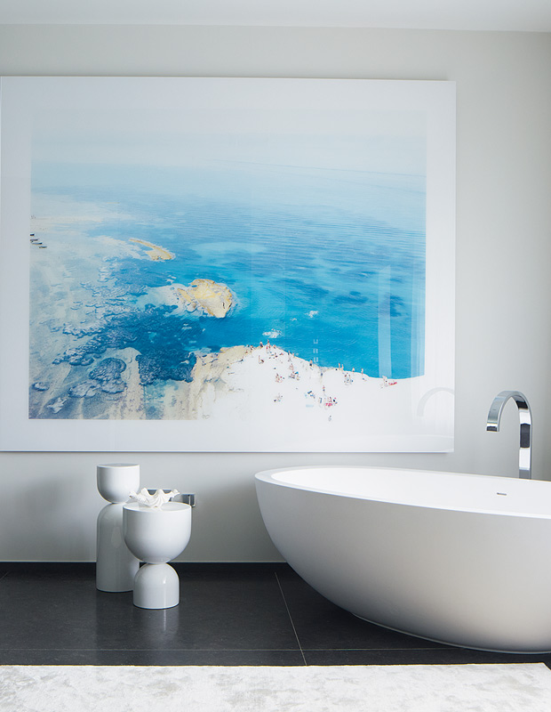 Beautiful bathrooms with a seaside painting
