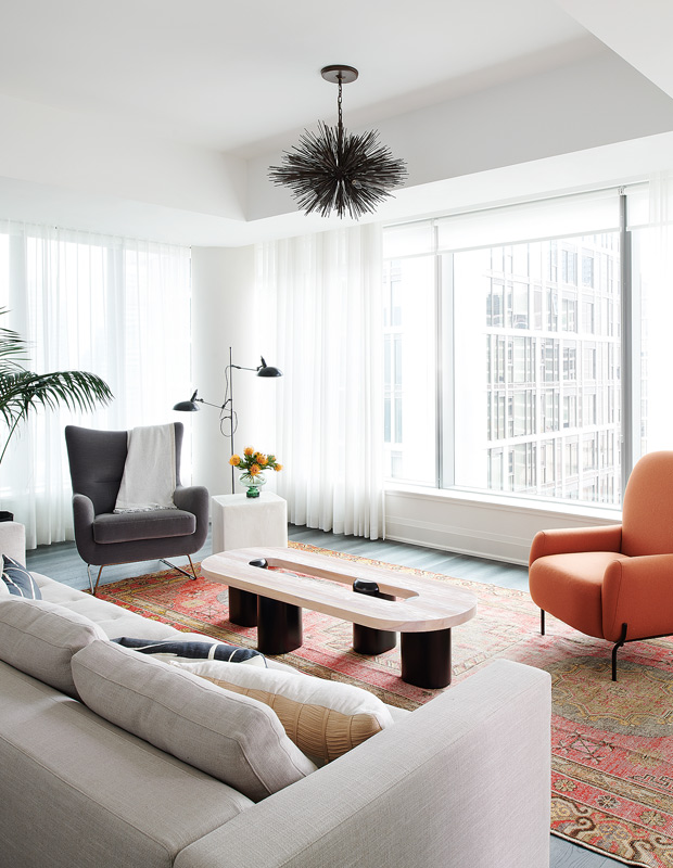 Patti Rosati artful condo living room with pops of peach
