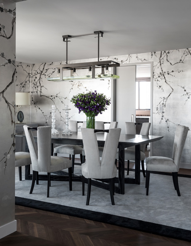 Ryan Korban luxurious living dining room with botanical wallpaper