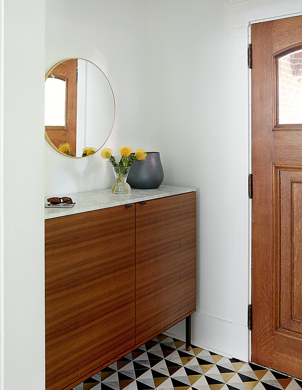 Shirley Meisels family home makeover entryway statement tile and sleek wood vanity