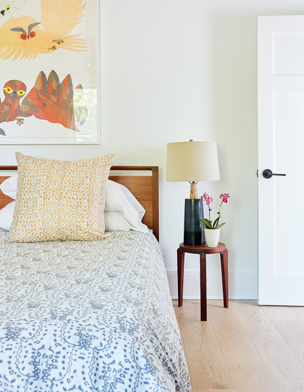 Shirley Meisels family home makeover bedroom with pops of yellow, blue and wood