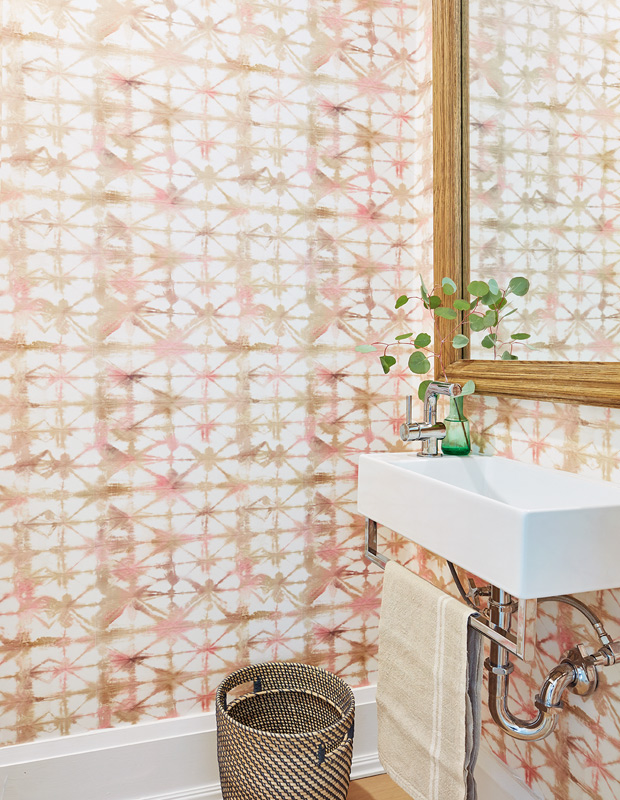Global style powder room with tie dye wallpaper