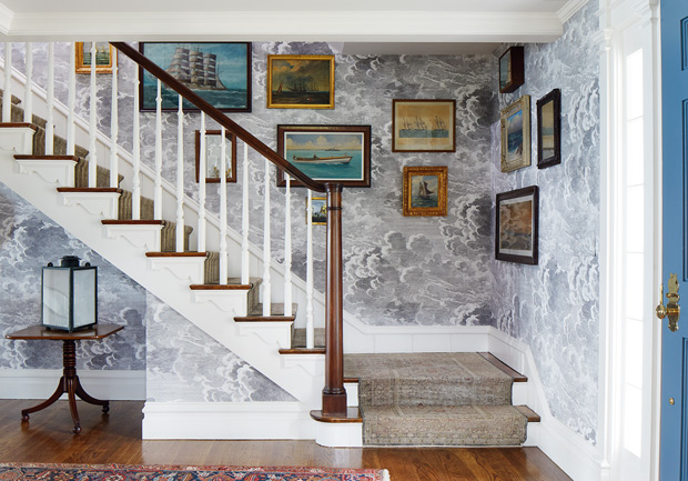 Tommy Smythe colonial revival staircase with nautical photographs