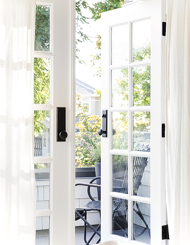 Tracey Ayton west coast home French doors overlooking the patio
