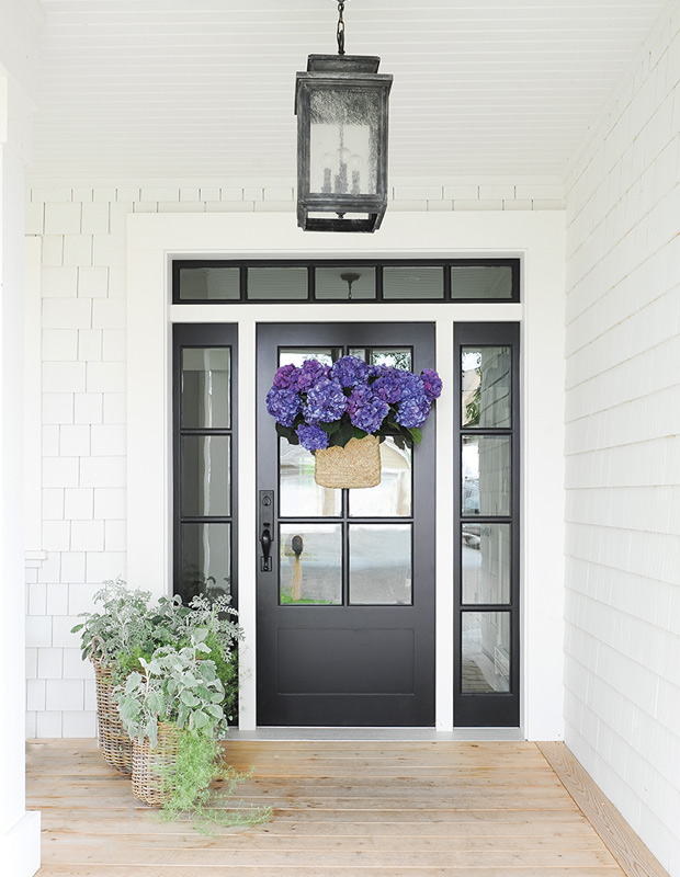Tracey Ayton west coast home front door with a fresh bouquet