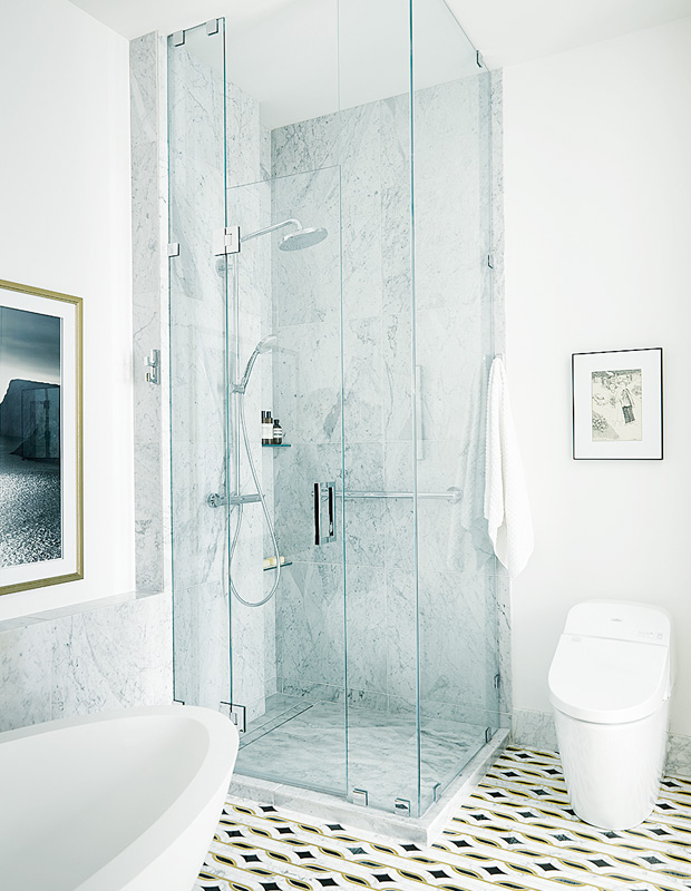 Modern glamour bathroom with a luxe glass shower
