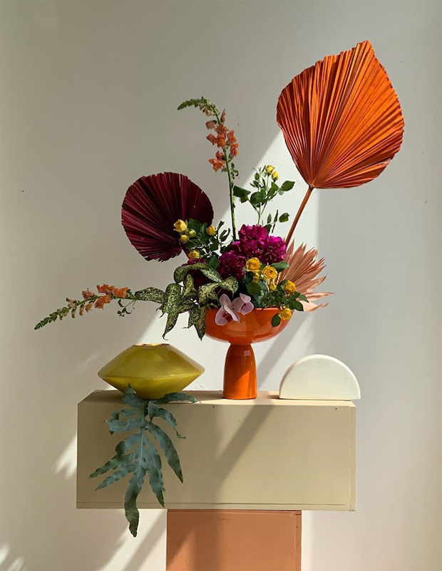 @matagalanplantae orange flower and vase