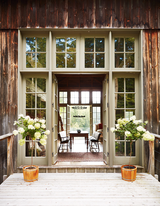 Melody Duron rustic country home French doors leading to the home