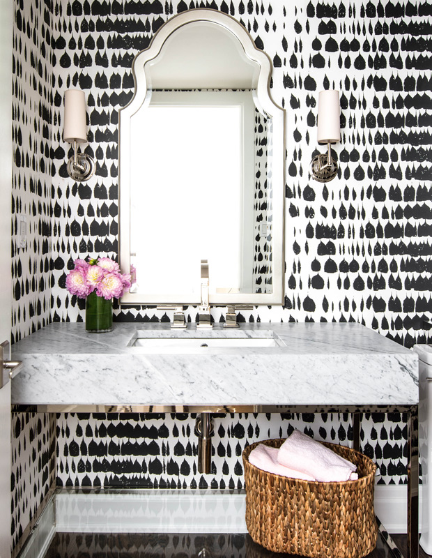 Powder room with graphic wallpaper