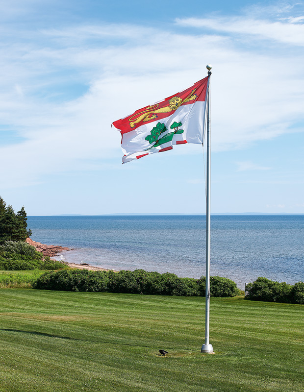 PEI summer home beach views and the provincial flag